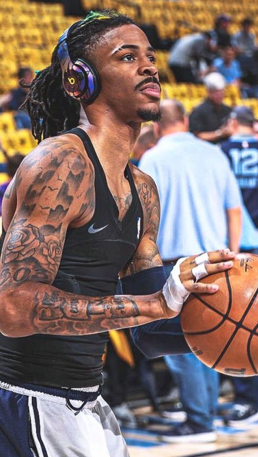 Grizzlies suspend Ja Morant after a video shows him with a gun.